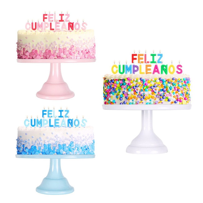 Vista delantera del velas de Feliz Cumpleaños en color azul, multicolor y rosa