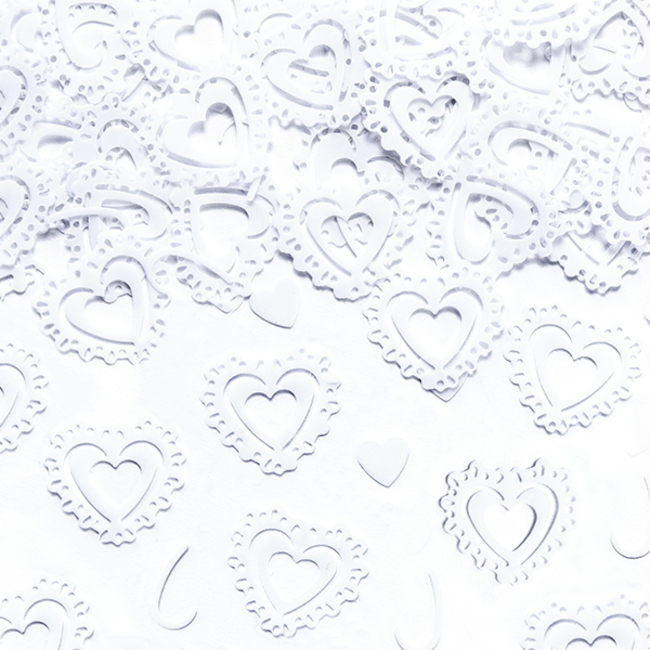 Vista principal del confetti de corazones blancos en stock