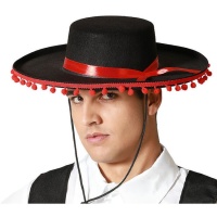 Sombrero cordobés con borlas rojas