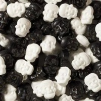 Sprinkles de calaveras blancas y negras de 56 gr - Wilton