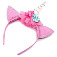 Diadema de unicornio color fucsia con flores